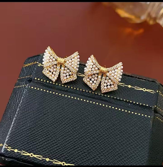 Elegant Pearl Bow Stud Earrings for Women | Gold Plated Party Wear Earrings | Designer Wedding Jewelry