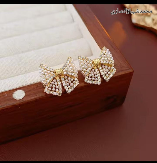 Elegant Pearl Bow Stud Earrings for Women | Gold Plated Party Wear Earrings | Designer Wedding Jewelry